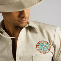Embroidered hospitality staff uniform for Jumby Bay Resort groundskeepers