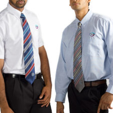 Men's long sleeved shirt and tie with embroidered corporate logo